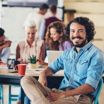 Young Professionals in Open office concept collaborating 